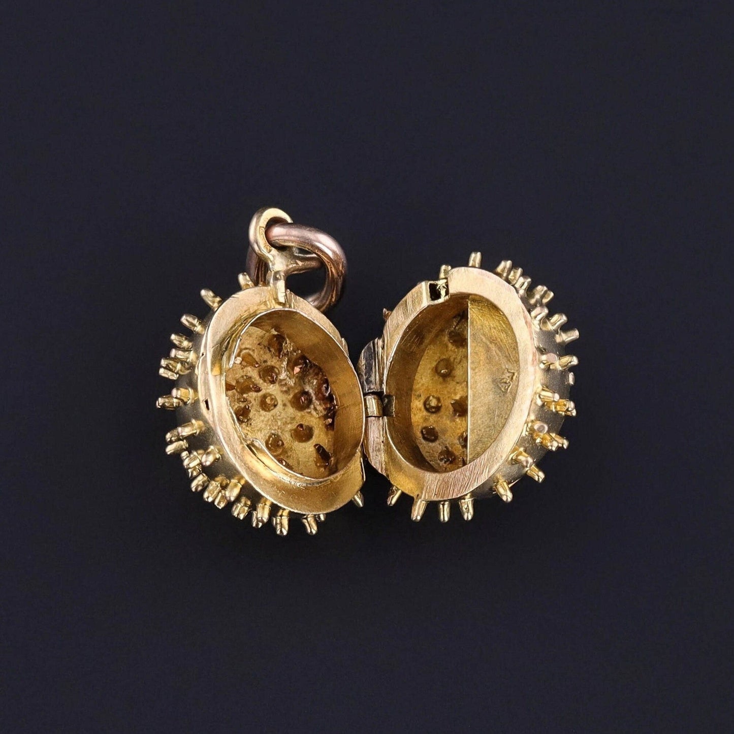 Antique Garnet Chestnut Locket of 14k Gold
